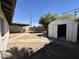 Backyard with covered patio, storage shed, and a spacious yard at 6131 N 36Th Dr, Phoenix, AZ 85019