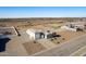 Aerial view of a house with a large backyard and surrounding desert landscape at 6608 N Cima Vista Dr, Casa Grande, AZ 85194