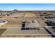 Aerial view showing the house's backyard and surrounding desert landscape at 6608 N Cima Vista Dr, Casa Grande, AZ 85194