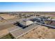 Aerial view of house with backyard, white fence, and surrounding desert landscape at 6608 N Cima Vista Dr, Casa Grande, AZ 85194