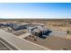 Aerial view of a house and surrounding desert landscape at 6608 N Cima Vista Dr, Casa Grande, AZ 85194