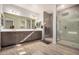 Double vanity bathroom with a large walk-in shower at 6608 N Cima Vista Dr, Casa Grande, AZ 85194