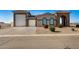 Single-story home with a large garage and landscaped front yard at 6608 N Cima Vista Dr, Casa Grande, AZ 85194