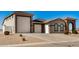 Single-story home with a large garage and landscaped front yard at 6608 N Cima Vista Dr, Casa Grande, AZ 85194