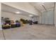 Large garage with overhead door and storage at 6608 N Cima Vista Dr, Casa Grande, AZ 85194