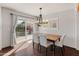 Bright dining room with sliding glass doors leading to patio at 6627 N 16Th Dr, Phoenix, AZ 85015