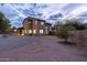 Two-story house with covered patio and large backyard at 6909 N 71St Dr, Glendale, AZ 85303