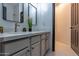 Bright bathroom featuring a quartz countertop and stylish sink at 6909 N 71St Dr, Glendale, AZ 85303