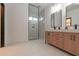 Bathroom with double vanity, quartz countertop and large shower at 6909 N 71St Dr, Glendale, AZ 85303