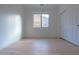 Bright bedroom with hardwood floors and double door closet at 6909 N 71St Dr, Glendale, AZ 85303