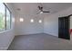 Bright bedroom with carpet flooring and ceiling fan at 6909 N 71St Dr, Glendale, AZ 85303