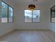 Bright dining room with hardwood floors and large windows at 6909 N 71St Dr, Glendale, AZ 85303