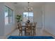 Light and airy dining room featuring hardwood floors and a wood dining table at 6909 N 71St Dr, Glendale, AZ 85303