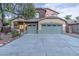 Two-story house with a two-car garage and landscaping at 6909 N 71St Dr, Glendale, AZ 85303