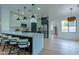 Modern kitchen with white and dark cabinets, quartz countertops at 6909 N 71St Dr, Glendale, AZ 85303