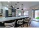 Modern kitchen with white and dark cabinets, quartz counters at 6909 N 71St Dr, Glendale, AZ 85303