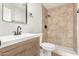 Updated bathroom with a shower and modern vanity at 7118 E Arbor Ave, Mesa, AZ 85208