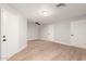 Spacious bedroom with light wood flooring and neutral walls at 7118 E Arbor Ave, Mesa, AZ 85208