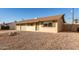 House exterior showcasing a two-car garage and front entrance at 7118 E Arbor Ave, Mesa, AZ 85208