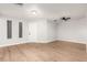 Bright living room with light wood flooring and neutral walls at 7118 E Arbor Ave, Mesa, AZ 85208