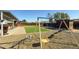 Backyard with playground and artificial turf at 7217 W Claremont St, Glendale, AZ 85303