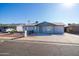 Well-maintained home with a landscaped front yard at 7217 W Claremont St, Glendale, AZ 85303