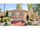 Two-story house with tile roof,balcony,landscaped yard, and two-car garage at 7500 E Mccormick Pkwy # 12, Scottsdale, AZ 85258