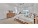 Bright bedroom with mid-century modern furniture and en-suite bathroom at 8043 E Jaeger St, Mesa, AZ 85207