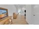 Bright entryway with wood floors and a wooden bench at 8043 E Jaeger St, Mesa, AZ 85207