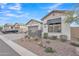 Two-story home with gray garage door and modern design at 8043 E Jaeger St, Mesa, AZ 85207