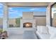 Outdoor fireplace with seating area perfect for relaxing at 8043 E Jaeger St, Mesa, AZ 85207