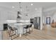 Modern kitchen with white cabinets and stainless steel appliances at 8043 E Jaeger St, Mesa, AZ 85207