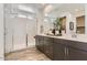 Double vanity bathroom with large walk-in shower at 8058 E Petra Ave, Mesa, AZ 85212