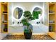 Modern bathroom with double sinks and unique decor at 815 E County Down Dr, Chandler, AZ 85249