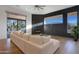 Relaxing living room with fireplace and large windows at 815 E County Down Dr, Chandler, AZ 85249