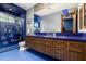 Bathroom with blue star-shaped tiles and a walk-in shower at 8515 E Sutton Dr, Scottsdale, AZ 85260