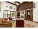 Open living area with high ceilings and a loft library at 8515 E Sutton Dr, Scottsdale, AZ 85260