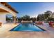 Inviting swimming pool with surrounding lounge chairs and patio area at 8515 E Sutton Dr, Scottsdale, AZ 85260