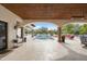 Spacious patio with a large pool, offering ample space for relaxation at 8515 E Sutton Dr, Scottsdale, AZ 85260