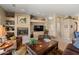 Cozy living room with fireplace and large windows at 9023 N Crown Ridge --, Fountain Hills, AZ 85268