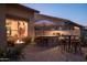 Evening view of patio with fire pit and seating area at 9023 N Crown Ridge --, Fountain Hills, AZ 85268