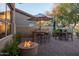 Cozy patio space with fire pit and outdoor kitchen at 9023 N Crown Ridge --, Fountain Hills, AZ 85268