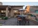 Outdoor patio with fire pit, seating, and built-in grill at 9023 N Crown Ridge --, Fountain Hills, AZ 85268