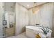 Relaxing bathroom with freestanding tub and chandelier at 9031 N 83Rd Way, Scottsdale, AZ 85258