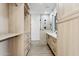 Spa-like bathroom with walk-in shower, dual sinks, and large closet at 9031 N 83Rd Way, Scottsdale, AZ 85258