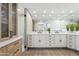 Elegant bathroom with double vanity, large mirror, and separate shower at 9031 N 83Rd Way, Scottsdale, AZ 85258