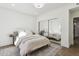 Serene bedroom with a queen bed and mirrored closet doors at 9031 N 83Rd Way, Scottsdale, AZ 85258