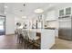 Contemporary kitchen featuring a large island and white cabinets at 9031 N 83Rd Way, Scottsdale, AZ 85258