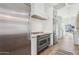 Sleek kitchen with stainless steel appliances and gray oven at 9031 N 83Rd Way, Scottsdale, AZ 85258