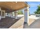 Covered patio with brick pavers and views of the pool and backyard at 9031 N 83Rd Way, Scottsdale, AZ 85258